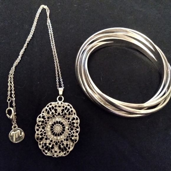 Jewelry - Silvertone necklace and interwined bangles